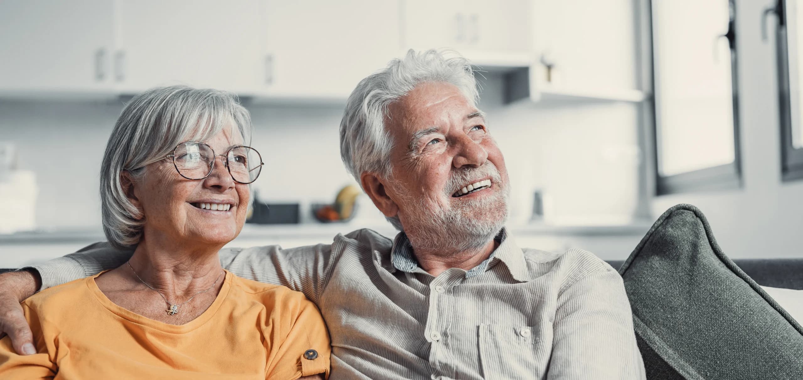Older adults smiling together at home