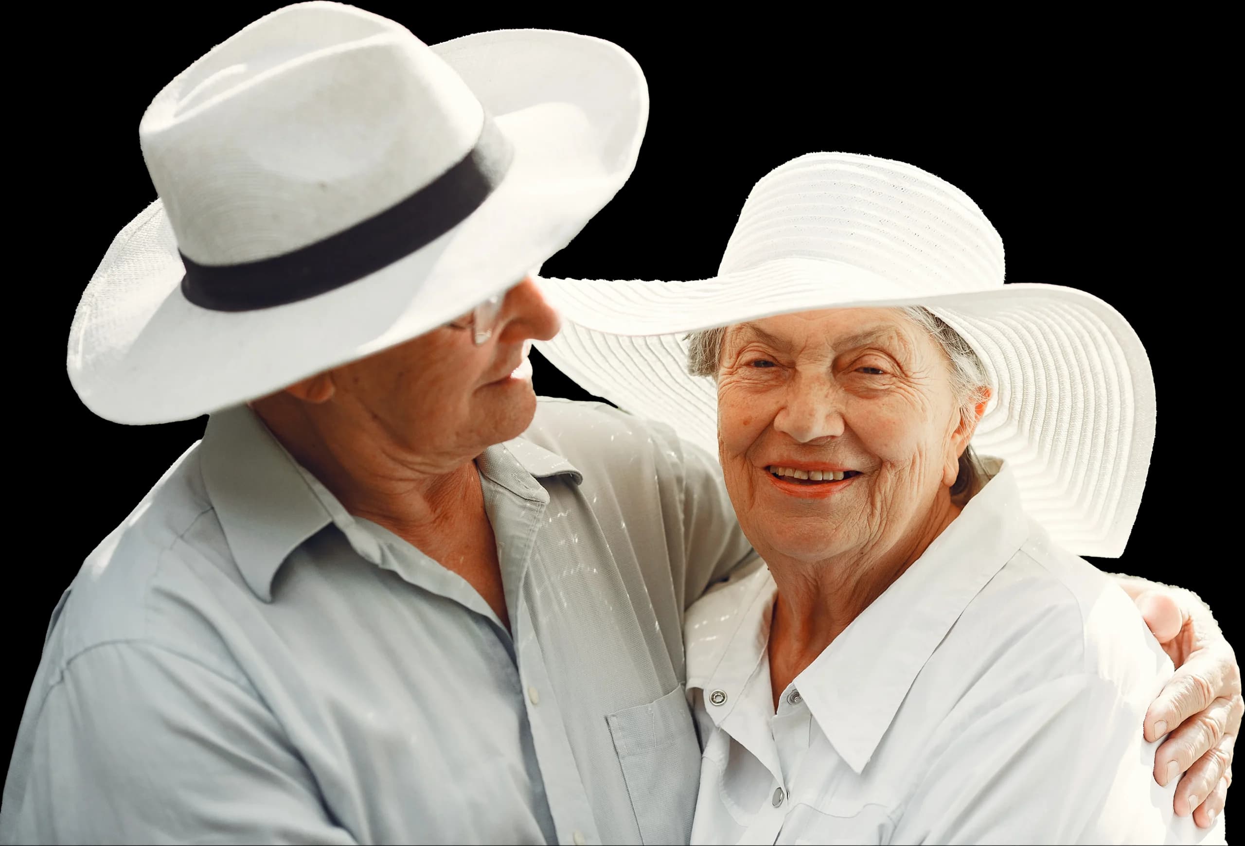 Senior couple wearing sun hats